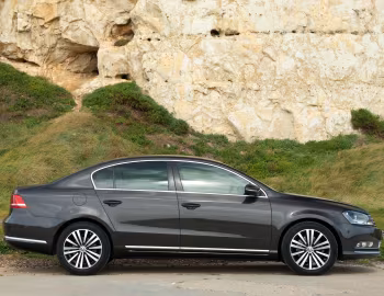 Volkswagen Passat TDI BlueMotion Sport [UK-spec] (B7) '2010–15