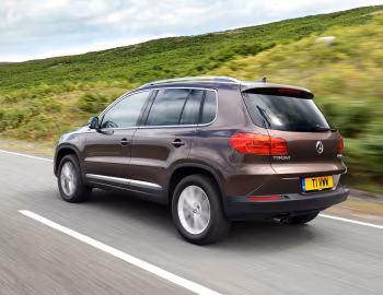 Volkswagen Tiguan Sport & Style [UK-spec] '2011–16