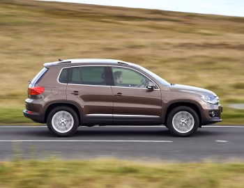 Volkswagen Tiguan Sport & Style [UK-spec] '2011–16