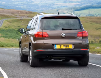 Volkswagen Tiguan Sport & Style [UK-spec] '2011–16