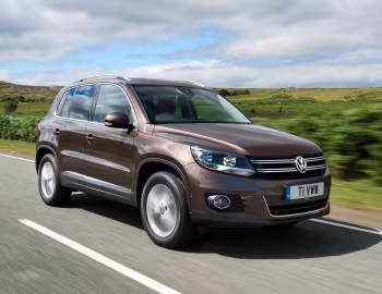 Volkswagen Tiguan Sport & Style [UK-spec] '2011–16
