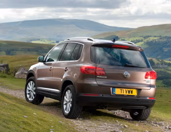 Volkswagen Tiguan Sport & Style [UK-spec] '2011–16