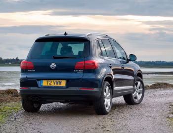 Volkswagen Tiguan Track & Style [UK-spec] '2011–16