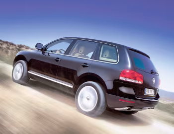 Volkswagen Touareg V6 TDI [Worldwide] (Typ 7L) '2004–07