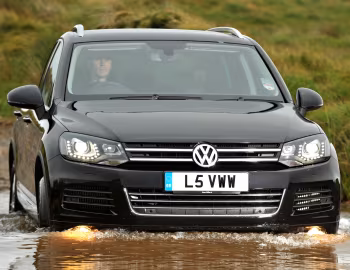 Volkswagen Touareg V6 TDI [UK-spec] (Typ 7P) '2010–14