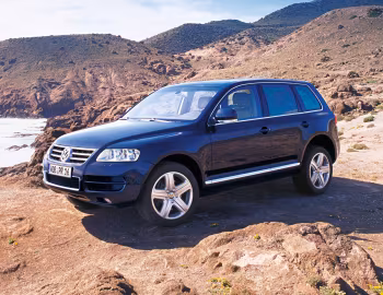 Volkswagen Touareg V6 TDI [Worldwide] (Typ 7L) '2004–07