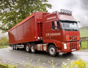 Volvo FH16 660 6×2 tractor Globetrotter XL cab [UK-spec] '2006–08
