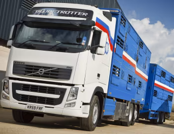 Volvo FH 460 6×2 rigid Globetrotter XL cab with livestock transporter body [UK-spec] '2009–12