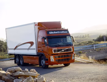 Volvo FM12 380 6×2 rigid Globetrotter cab with PLS body '2001–05