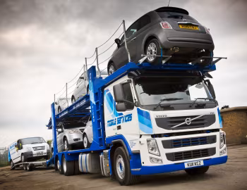 Volvo FM 330 6×2 rigid Low sleeper cab with Belle Trailers five-car carrier body [UK-spec] '2010–13