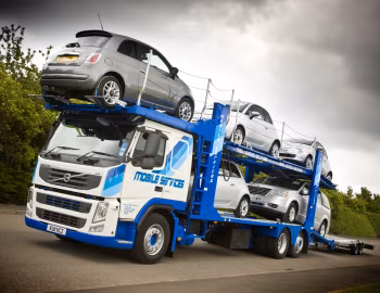 Volvo FM 330 6×2 rigid Low sleeper cab with Belle Trailers five-car carrier body [UK-spec] '2010–13