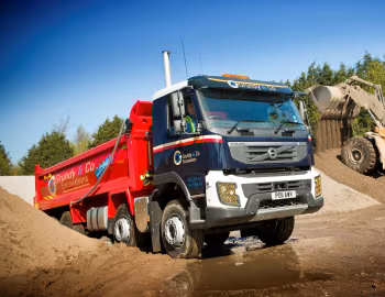 Volvo FMX 380 8×4 rigid Day cab with tipper body [UK-spec] '2009–13