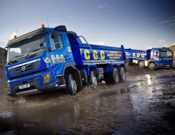 Volvo FMX 410 8×4 rigid Day cab with ABBA tipper body [UK-spec] '2009–13